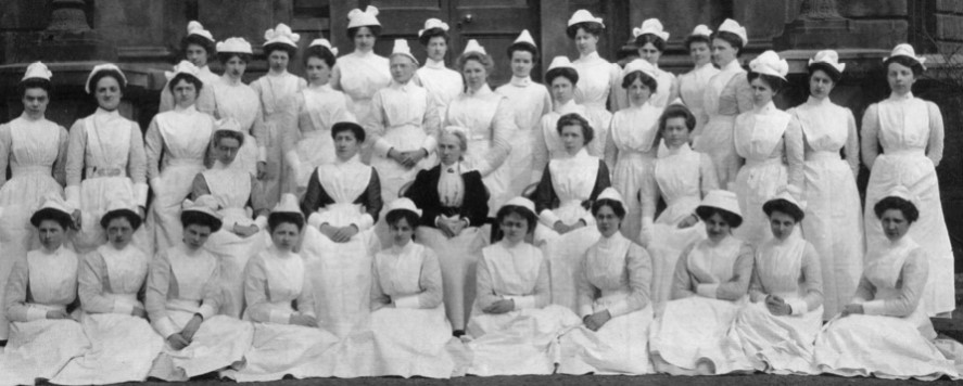 Rebecca Strong, 2nd row centre, with assistant matrons and graduating pupil nurses c1900, pictured in front of the South door of The Adam building